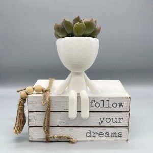 people planters seated