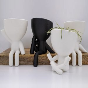 sitting people planter